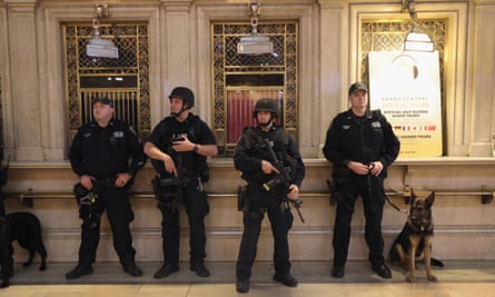 New York City policemen stand guard in Grand Central Terminal on Wednesday in New York City.