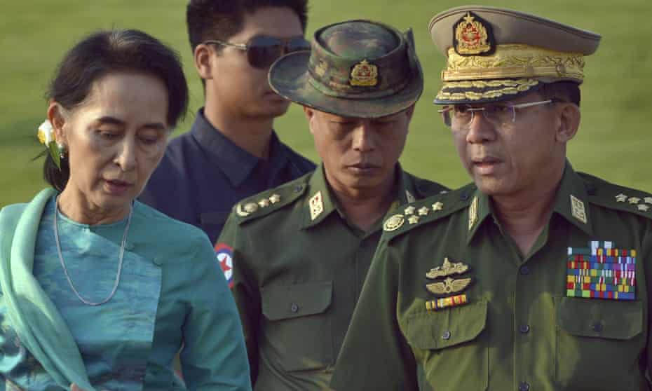 Aung San Suu Kyi with Min Aung Hlaing, right, who made ‘a serious miscalculation’ when he launched the coup. 