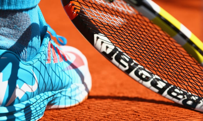 A glimpse of Nadal’s blue shoes.