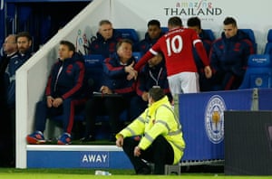 Wayne Rooney shakes hands with Louis van Gaal after being substituted.