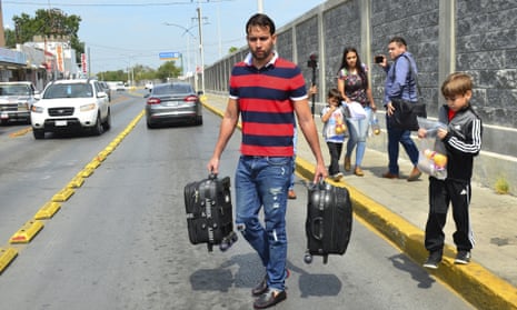 The Ascencio family from Venezuela are returned by US authorities to Nuevo Laredo, Mexico as part of the so-called Remain in Mexico program for asylum seekers this month.