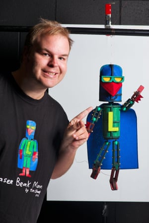 Sharp with the puppet version of his character, Laser Beak Man.