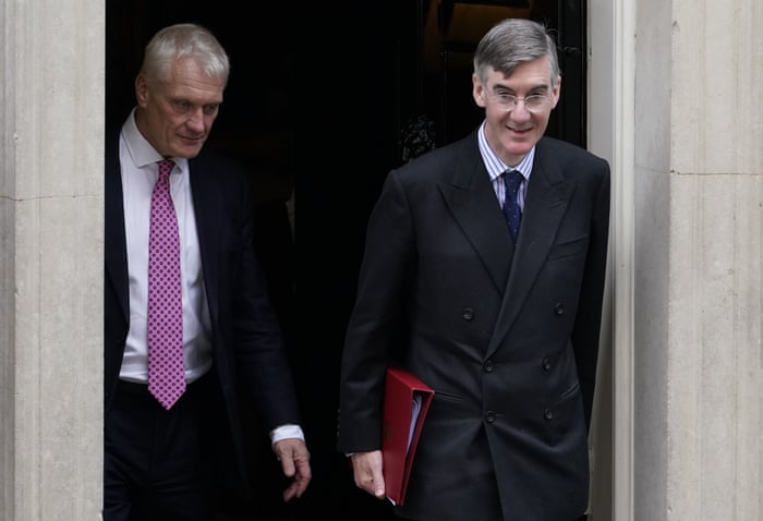 Jacob Rees-Mogg, the new business secretary, and Graham Stuart,