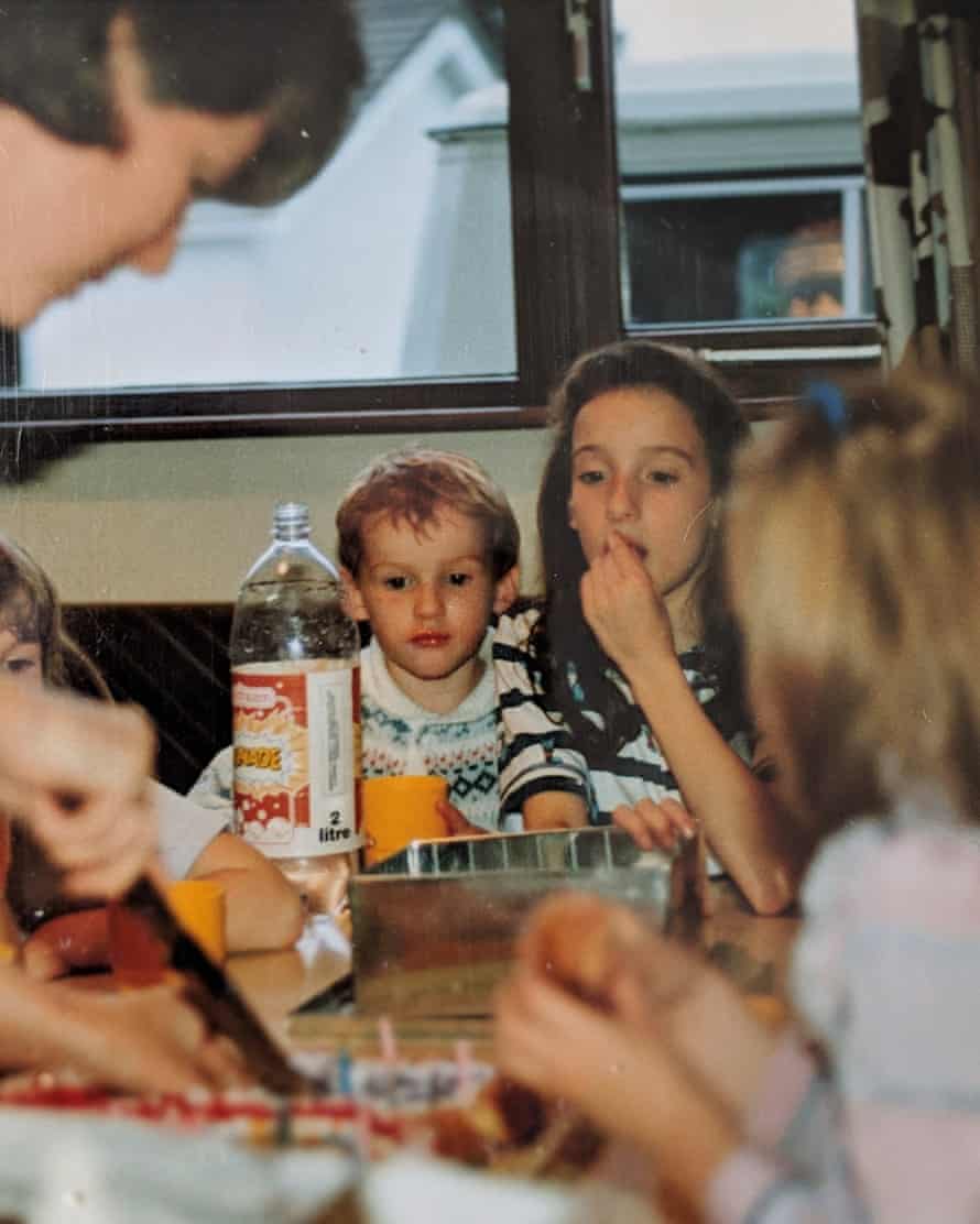 Teatime and sympathy: Séamas sits with his sister Orla for lemonade and biscuits in 1989.