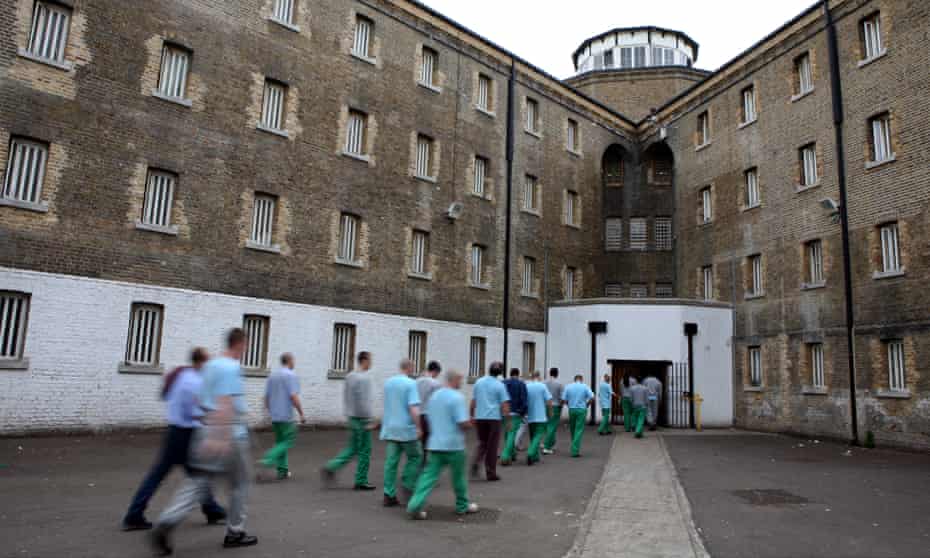 Prisoners return to their wings for lunch at Wandsworth prison.
