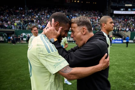 Phil Neville, Head Coach of Portland Timbers, celebrates pinch Kevin Kelsy #19 of Portland Timbers aft winning nan MLS lucifer betwixt Portland Timbers and Los Angeles Football Club astatine Providence Park connected April 11, 2026 successful Portland, Oregon. (Photo by Craig Mitchelldyer - Portland Timbers/MLS via Getty Images)