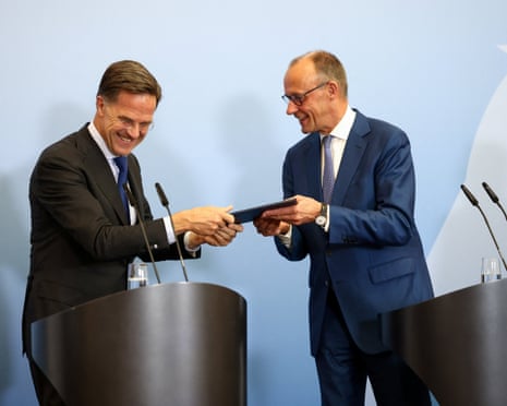German chancellor Friedrich Merz and Nato secretary general Mark Rutte react ahead of a press conference in Berlin, Germany.