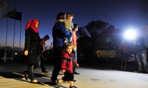 Syrian refugees arrive at a designated accommodation area near Nicosia, Cyprus.