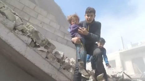 Bodycam footage shows children being rescued from rubble in eastern Ghouta, Syria – video 
