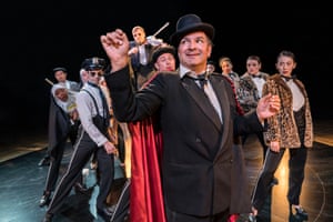 Julius D’Silva as Max Bialystock, with the cast of The Producers in 2018, directed by Raz Shaw and designed by Ben Stones.