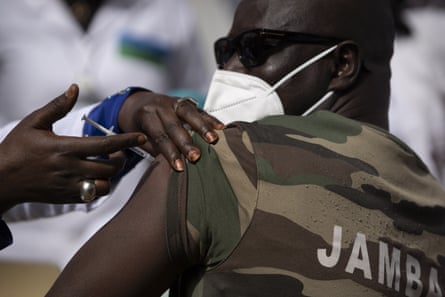 A member of Senegal’s military receives China’s Sinopharm vaccine in Dakar