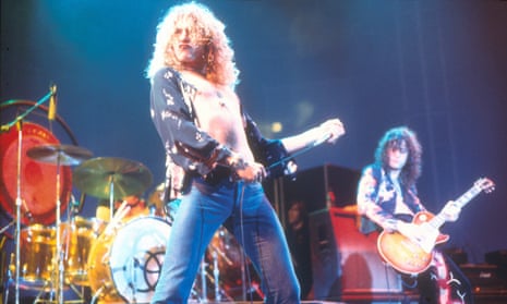 Led Zeppelin performing live on stage in 1975.