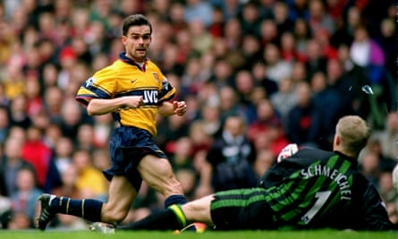 Arsenal's Marc Overmars scores the winner against Manchester United at Old Trafford in March 1998