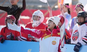 Torch bearer Wang Meng takes part in the Beijing 2022 Olympic Torch relay on Wednesday.