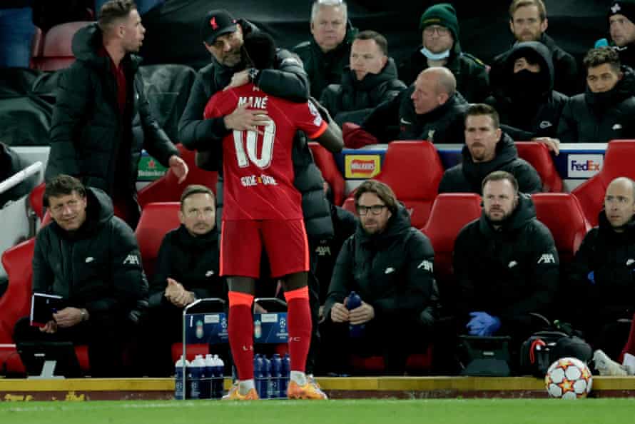 Liverpool manager Jurgen Klopp gives Sadio Mane a congratulatory hug as he is substituted.