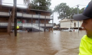 Australia news live update: Sydney floods wreak havoc; Manly dam begins to spill as NSW flood waters rise; man shot by NT police 3 Angelo Testa drives his dinghy up and down the flooded road to check in on his neighbours