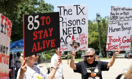 People protest against poor conditions caused by extreme heat in Texas jail cells at the state capitol in Austin, Texas, on 18 July.