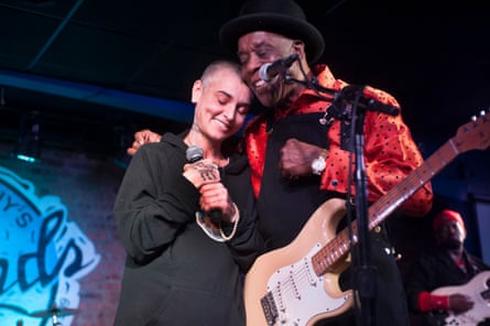 Performing with blues star Buddy Guy in 2016.