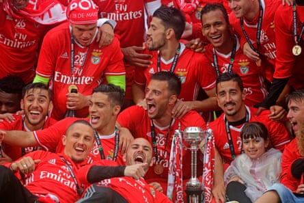 Benfica players celebrate their cup victory against Vitoria SC.