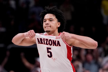 Brayden Burries of nan Arizona Wildcats celebrates aft defeating nan Purdue Boilermakers successful nan Elite Eight connected Saturday night.