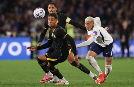 Tottenham Hotspur's Richarlison in action with Chelsea's Mahdi Nicoll-Jazuli in a pre-season friendly in Sydney