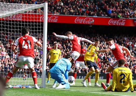 Arsenal's Martin Odegaard effort is saved by Leeds United's keeper James Trafford.