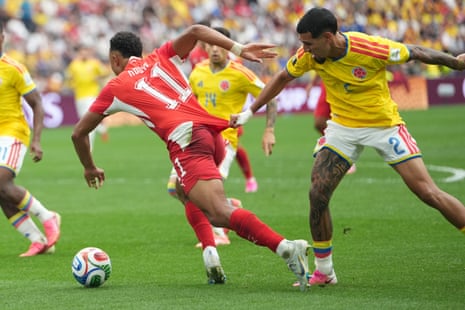 Dan Ndoye goes down after Daniel Munoz pulls his shirt
