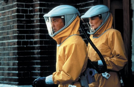 ‘They became the definitive biohazard suit for decades’ ... Dustin Hoffman and Rene Russo ready for action in Outbreak. Photograph: Peter Sorel/Warner Bros/Punch Prods/Kopelson/Kobal/Rex/Shutterstock