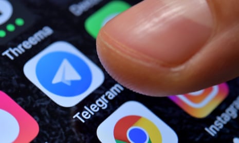 The Telegram app icon on a mobile phone