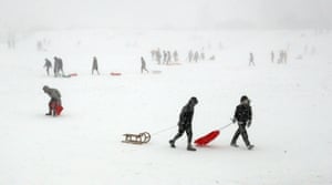 Sledging during blizzards in Whitley Bay, North Tyneside