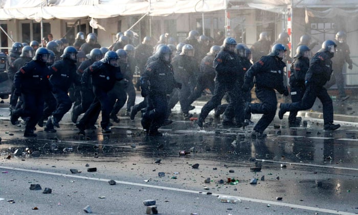 German police advance toward protesters during a demonstration at the G20 summit in Hamburg.