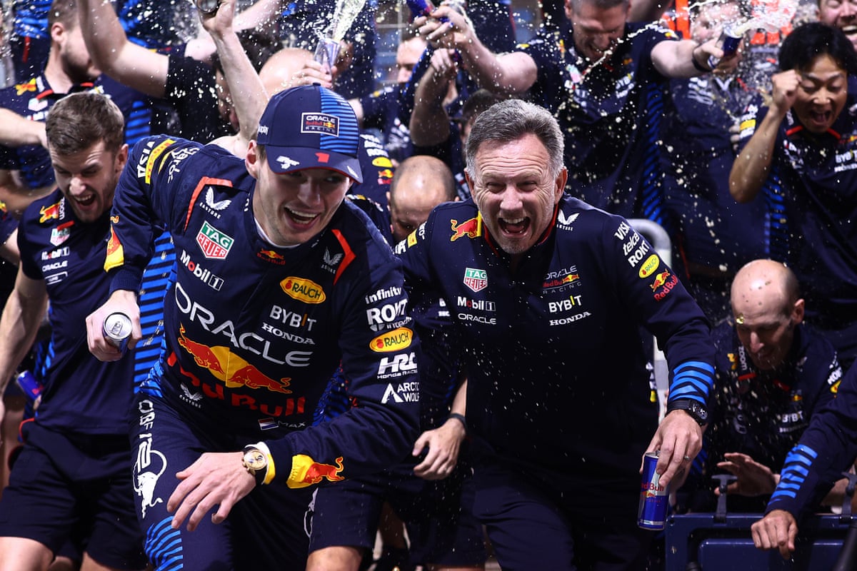 Max Verstappen and Christian Horner celebrate in 2024.