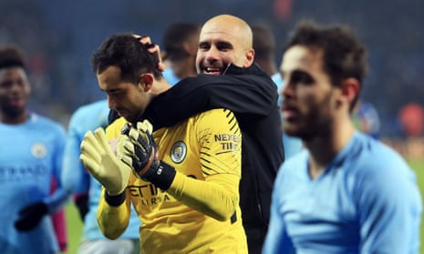 Pep Guardiola celebrates with Claudio Bravo after the penalty shootout.