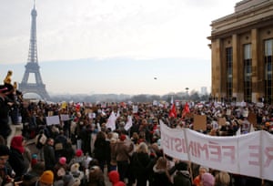 Protesters take part in the Women’s March in Paris, France