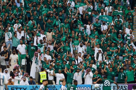 Saudi Arabia fans cheer their team towards the end of the match as they lead Argentina 2-1.