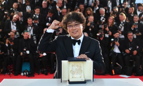 South Korean director Bong Joon-Ho celebrates with his trophy after he won the Palme d’Or for the film Parasite.