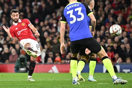 Manchester United’s Bruno Fernandes (left) shoots and scores his team second goal.