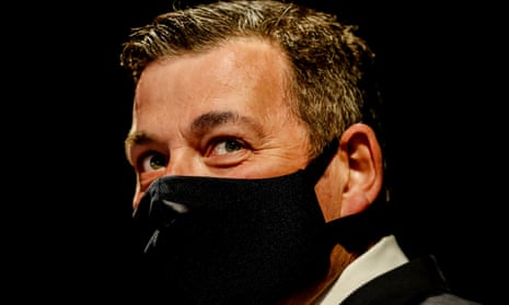 Victorian premier Daniel Andrews wears a black mask at a press conference in Melbourne