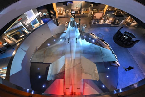 Overhead view of fighter jet in a gallery