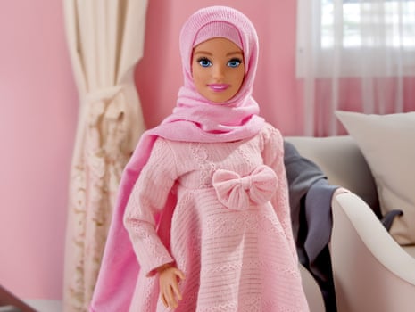 A doll, called Hijarbie, dressed in pink dress and hijab 