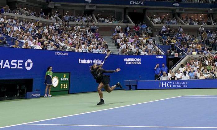 Serena Williams covers the court.