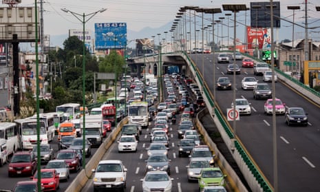 Cars sit in traffic in Mexico City, Mexico