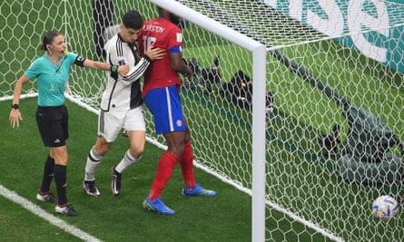 Stéphanie Frappart steps in when Costa Rica defender Kendall Waston argues with German midfielder Kai Havertz.
