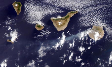 A satellite image of smoke emerging from Gran Canaria island (on the right), on Sunday.