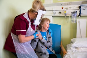 Margaret Keenan, 90, with health care assistant Lorraine Hill