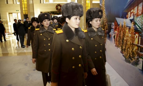 Members of the Moranbong band arrive at a hotel in central Beijing, China.