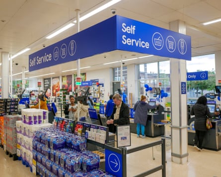 Self service checkouts in Tesco supermarket.