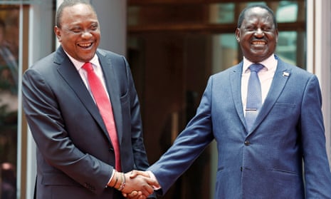 Uhuru Kenyatta, left, greets Raila Odinga at the president’s Nairobi office