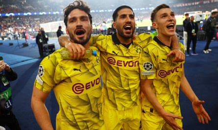 (From left) Mats Hummels, Emre Can and Nico Schlotterbeck of Borussia Dortmund celebrate booking a place in the Champions League final