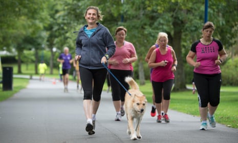 Women jogging with dog